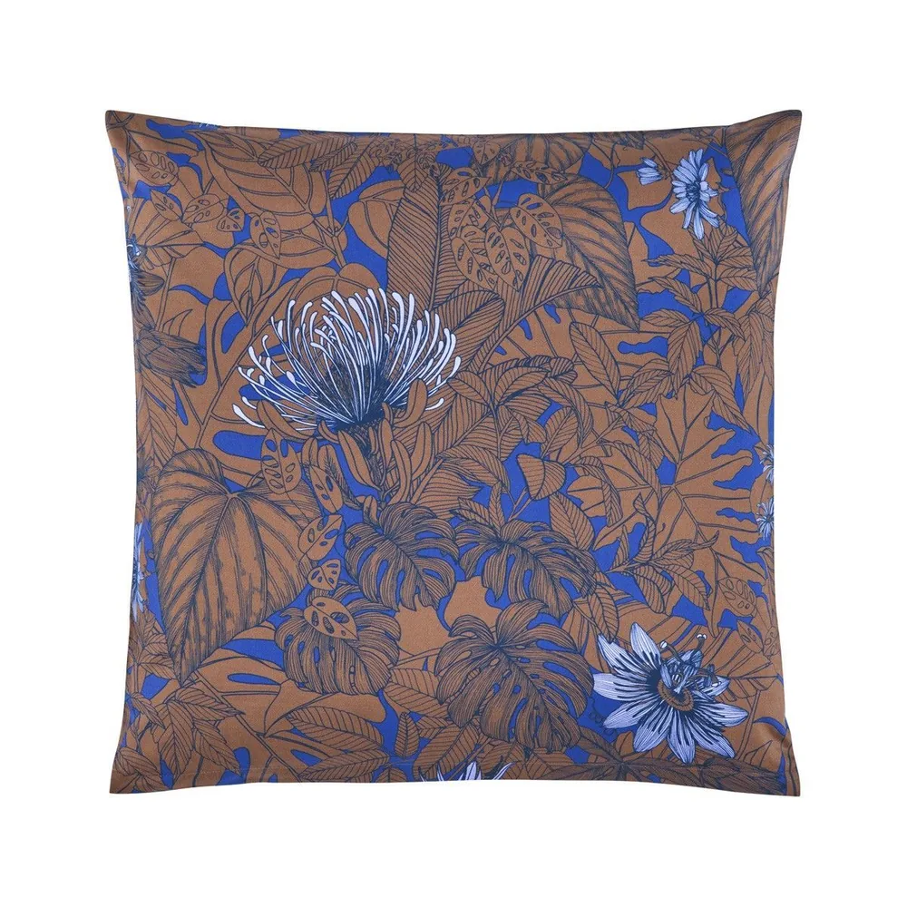 A white cushion with yellow dandelions